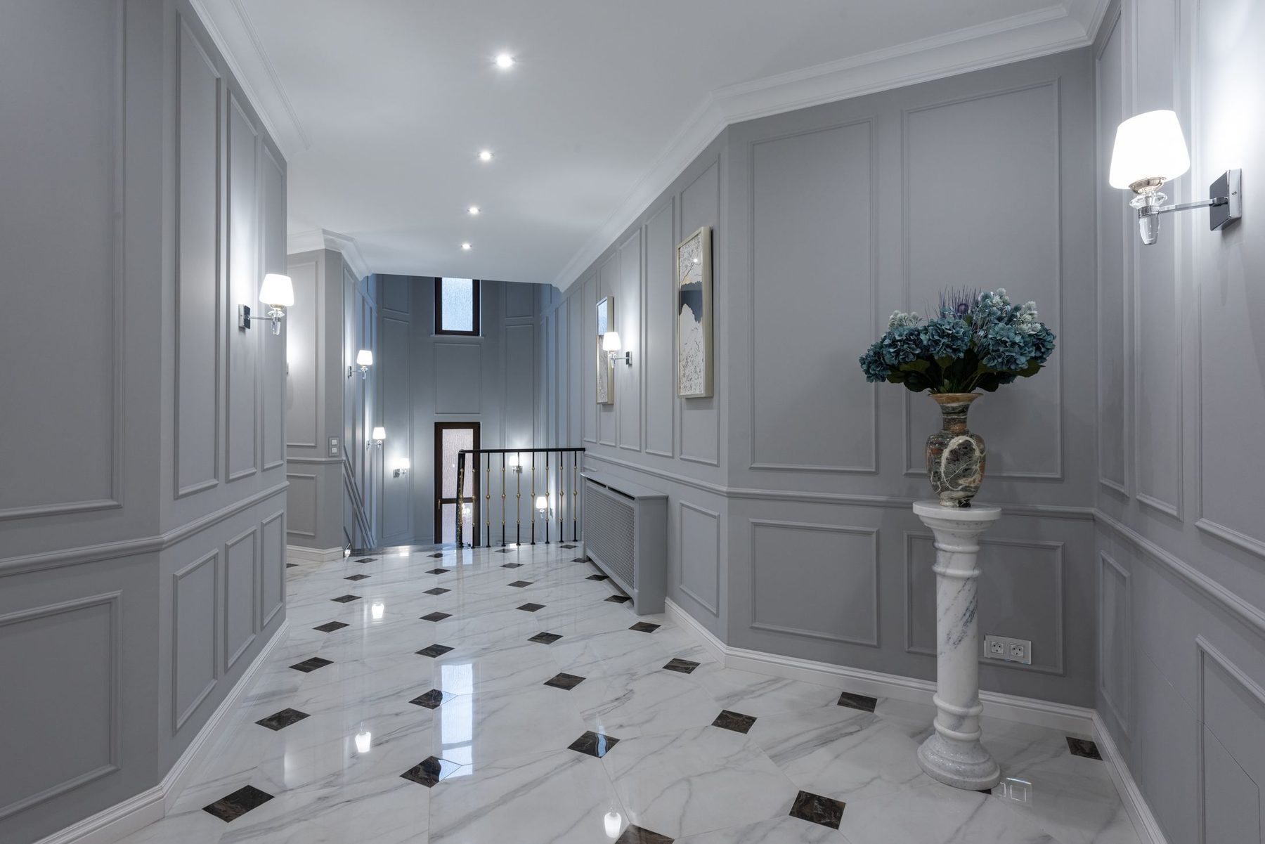 A panelled hallway in a period house, the kind of space a whole-house scheme starts from